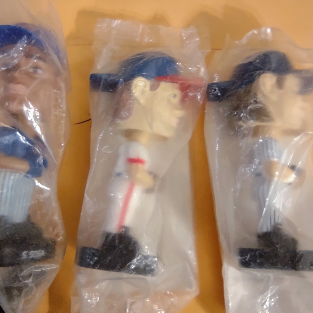 3 pro baseball mini  bobble heads Sammy Sosa,C Jones and J Giambi.Still in bags.